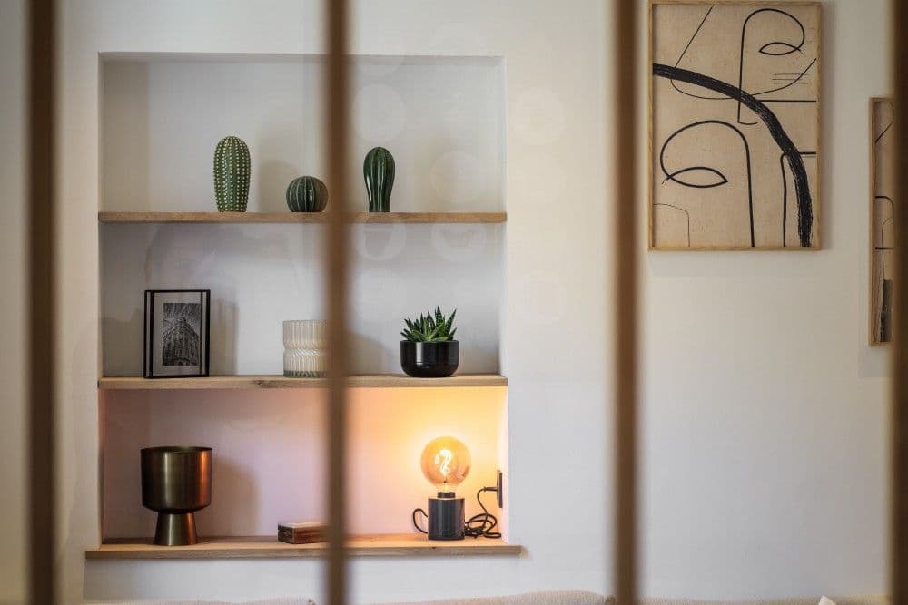 Alcove with shelves and decorative lighting, 2-bedroom apartment in the Old Town, Nice