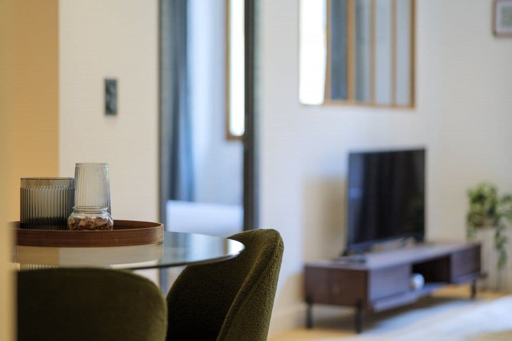 Dining table and living room beyond, 2-bedroom apartment in the Old Town, Nice