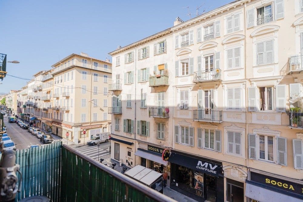 Balcony overlooking a street of Belle Époque buildings, 3-bedroom apartment in the Port, Nice