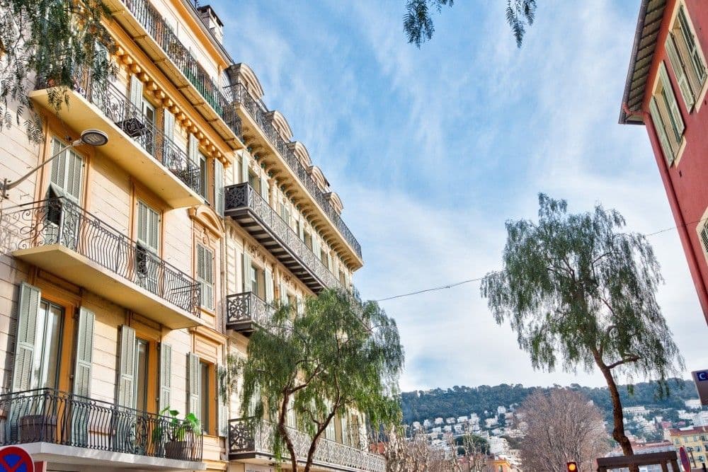 Street of Belle Époque buildings with pepper trees near the Port, 2-bedroom apartment in the Port, Nice