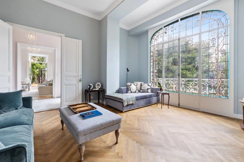 Sitting room with arched picture window and herringbone parquet, 4-bedroom villa in Mont Boron, Nice