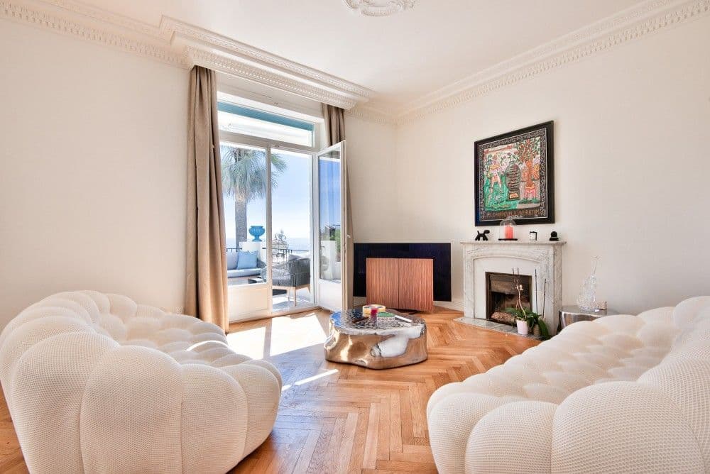 Living room with sculptural sofas, marble fireplace and sea view, 4-bedroom villa in Mont Boron, Nice