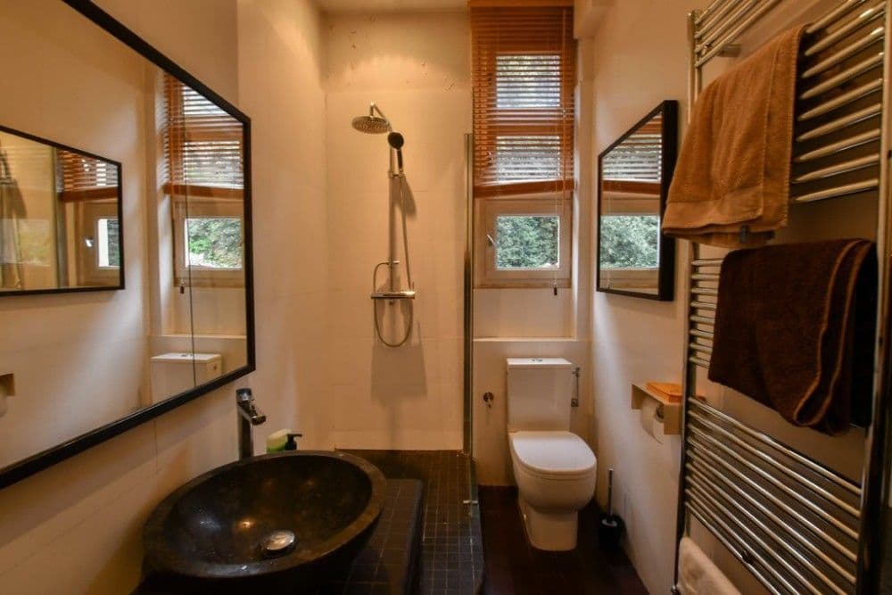 Shower room with stone basin, rain shower and heated towel rail, 1-bedroom apartment in the Port, Nice