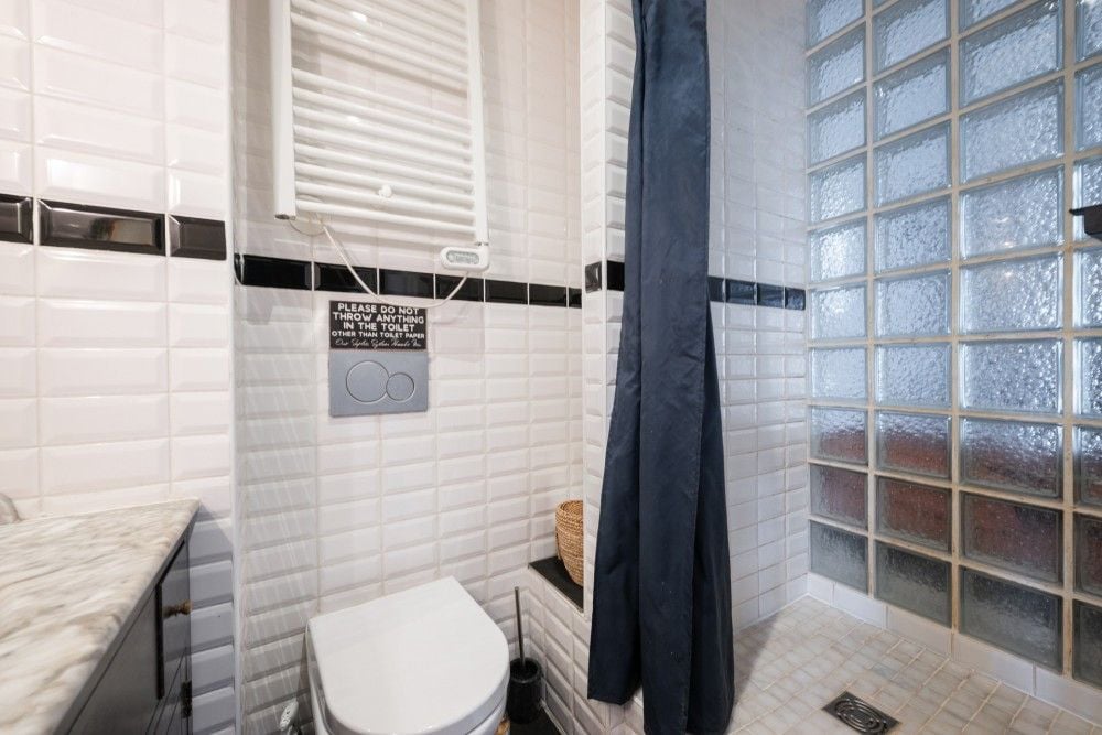 Shower room with metro tiles and glass blocks, 1-bedroom apartment in the Port, Nice