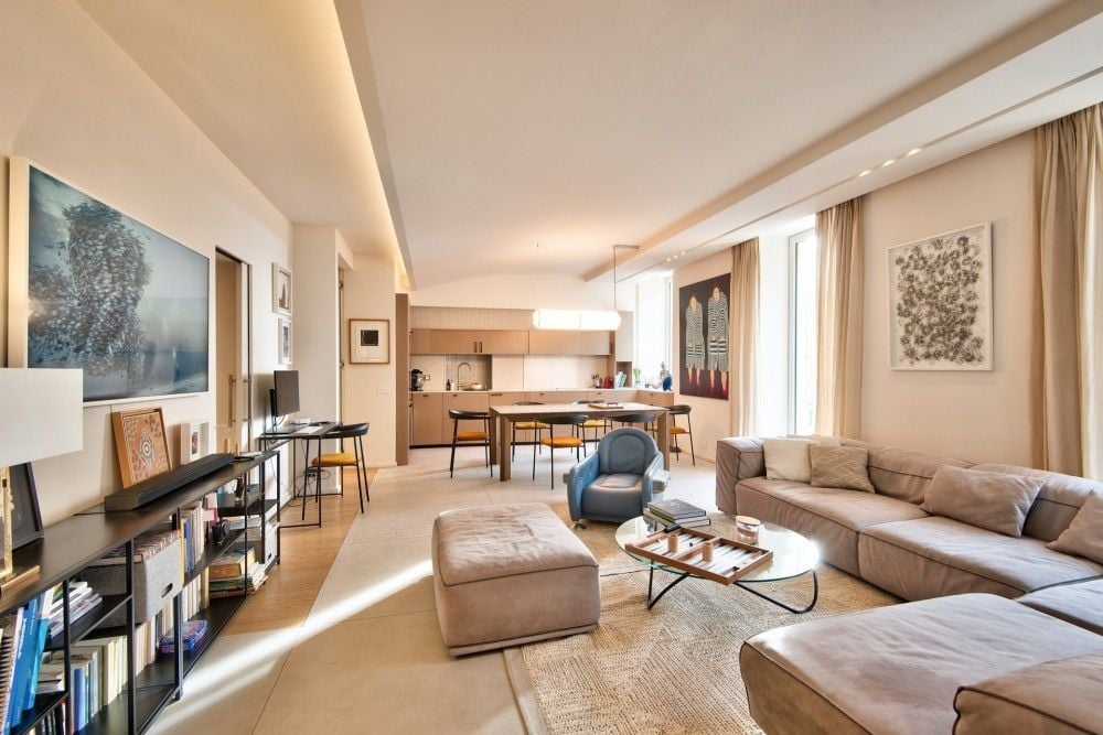 Living room with corner sofa, dining table and open kitchen, 2-bedroom apartment in the Port, Nice