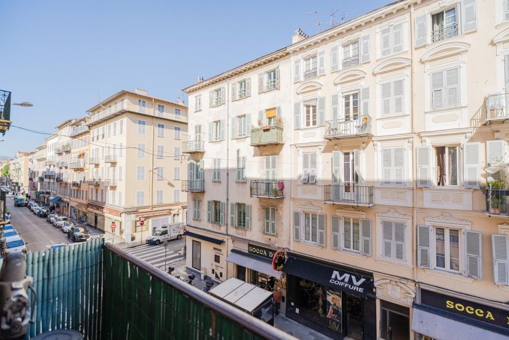 Balcony overlooking a street of Belle Époque buildings, 3-bedroom apartment in the Port, Nice