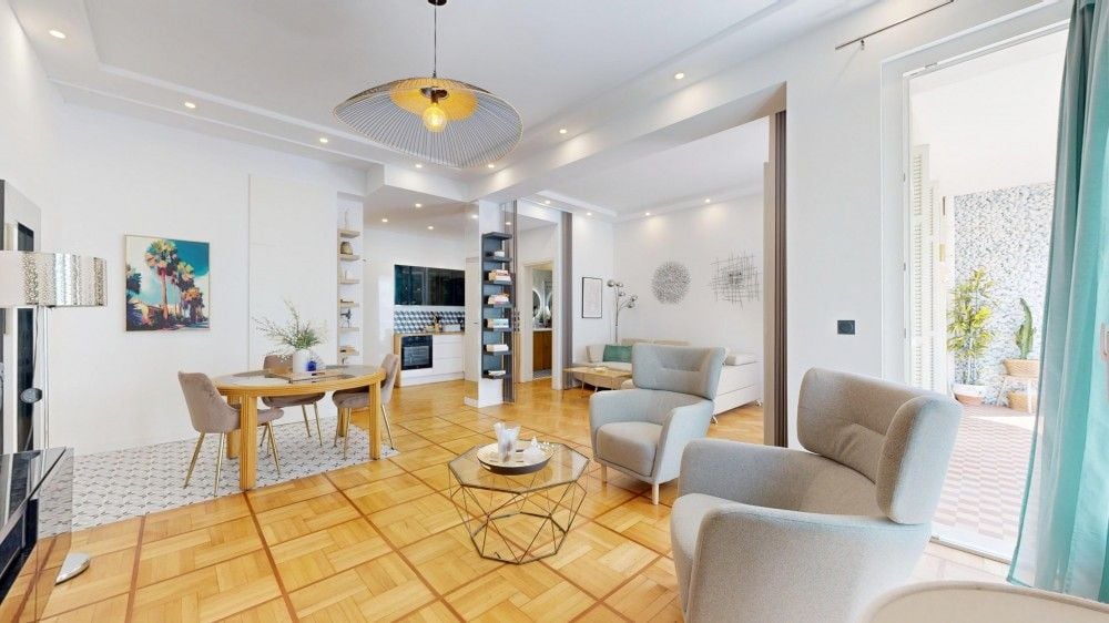 Living and dining room with parquet floor and doors to the balcony, 1-bedroom apartment in the Promenade des Anglais, Nice