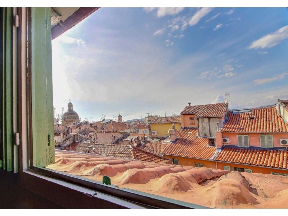 View over the terracotta rooftops and domes of Vieux Nice, 2-bedroom apartment in the Old Town, Nice