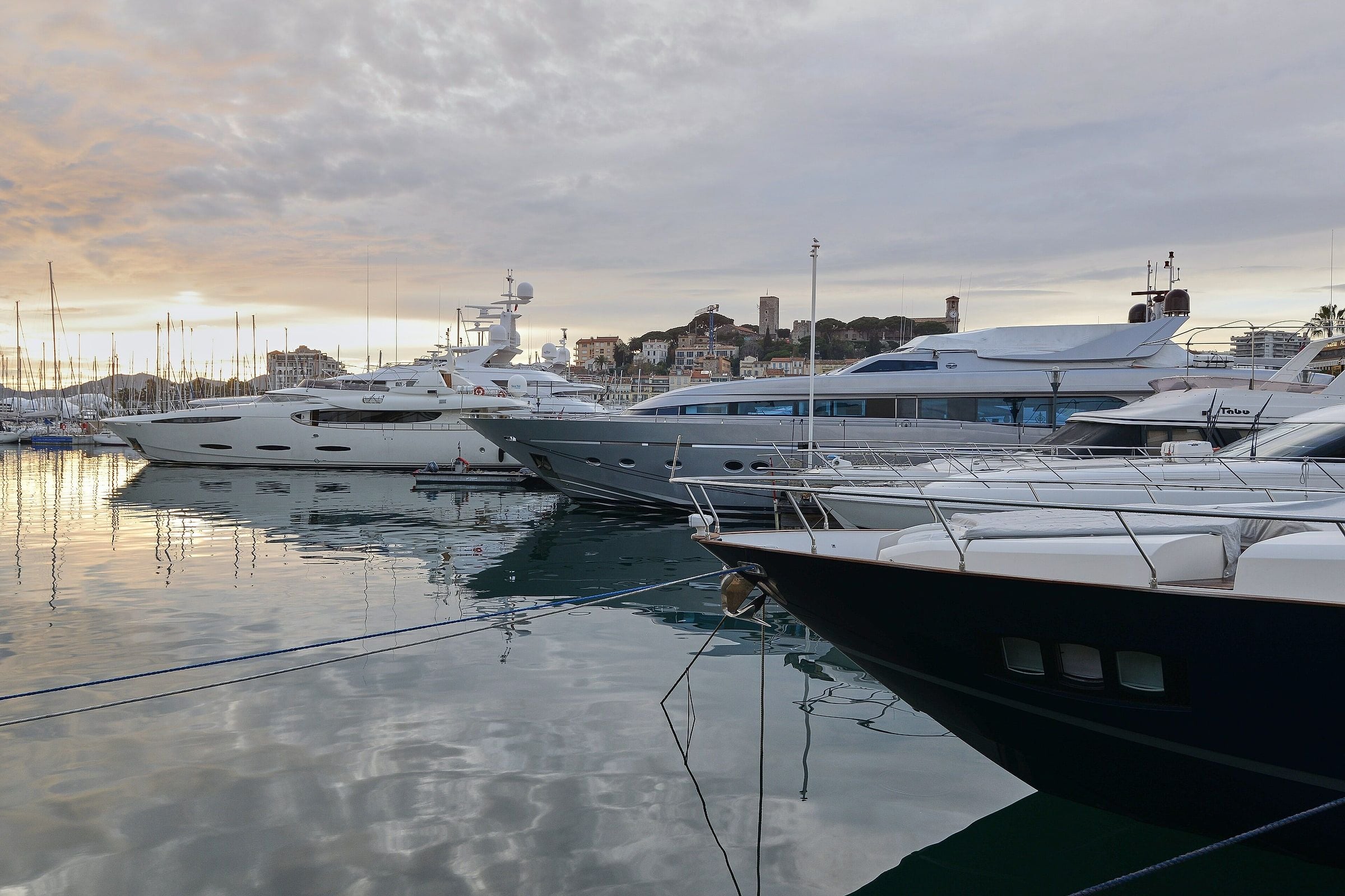 Yachts moored in the Vieux Port of Cannes at dusk