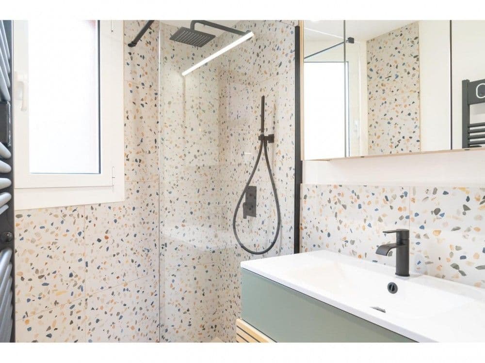 Shower room with terrazzo tiles, rain shower and black fittings, 2-bedroom apartment in the Old Town, Nice