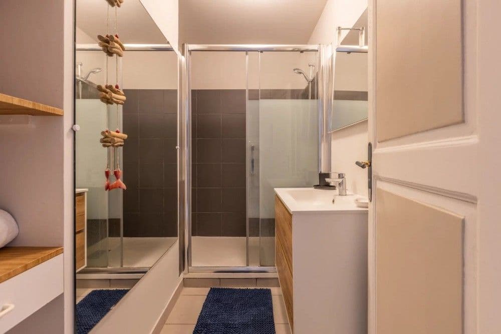 Shower room with walk-in shower and wooden vanity, 2-bedroom apartment in the Port, Nice