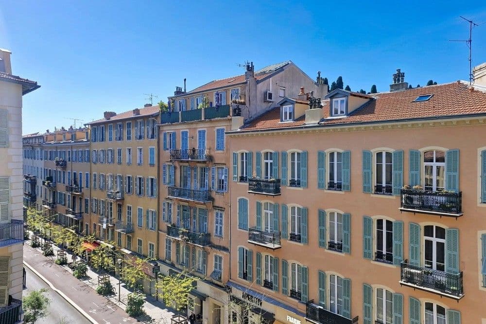 View over Belle Époque buildings on a tree-lined street, 2-bedroom apartment in the Port, Nice