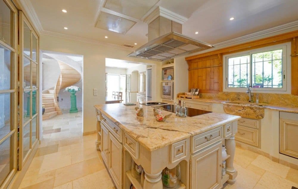 Kitchen with marble-topped island and stainless steel hood, 3-bedroom villa in Fabron, Nice