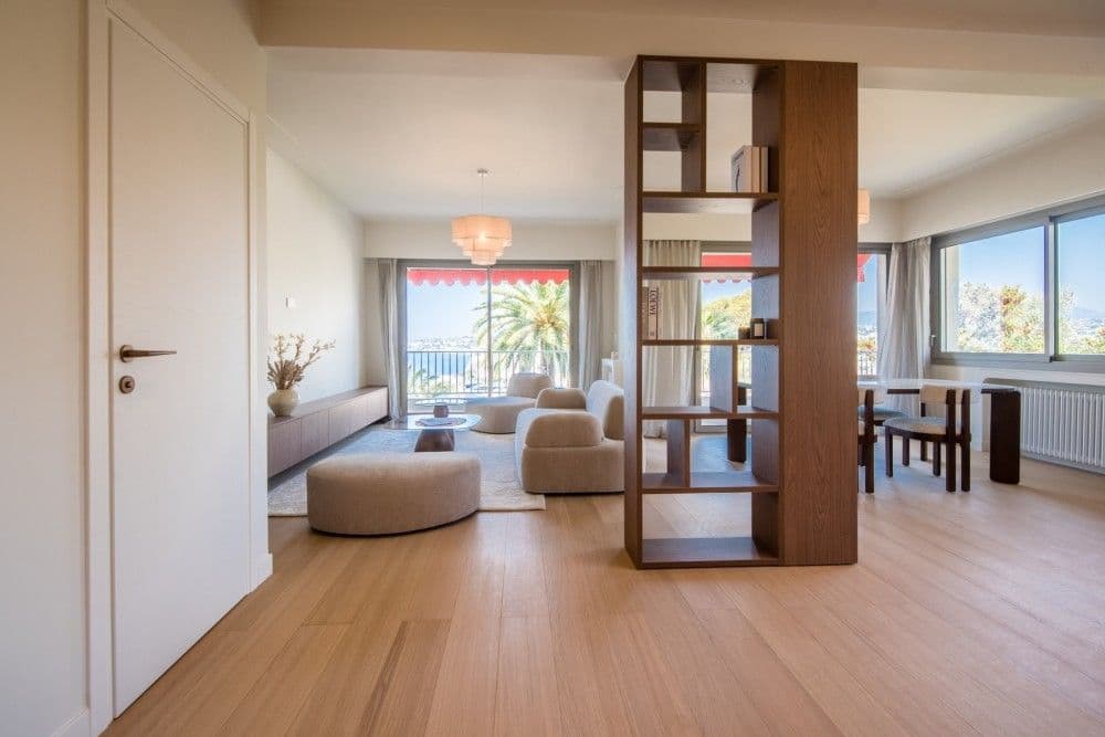 Living room with walnut room divider and sea view, 2-bedroom apartment in Mont Boron, Nice