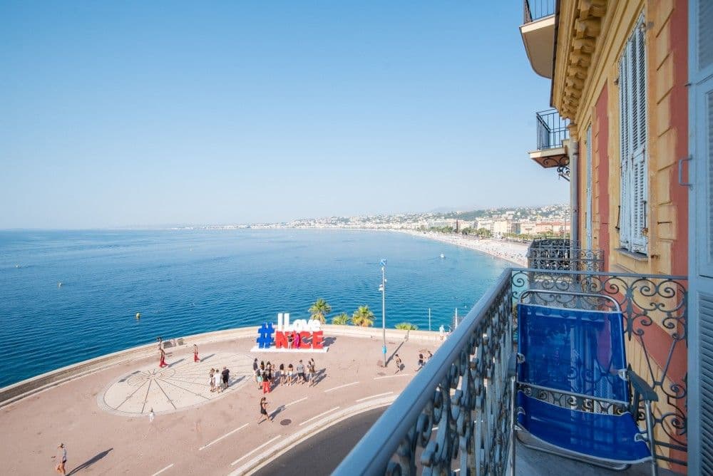 Balcony view over the Rauba Capeu point and the Baie des Anges, 3-bedroom apartment in the Promenade des Anglais, Nice