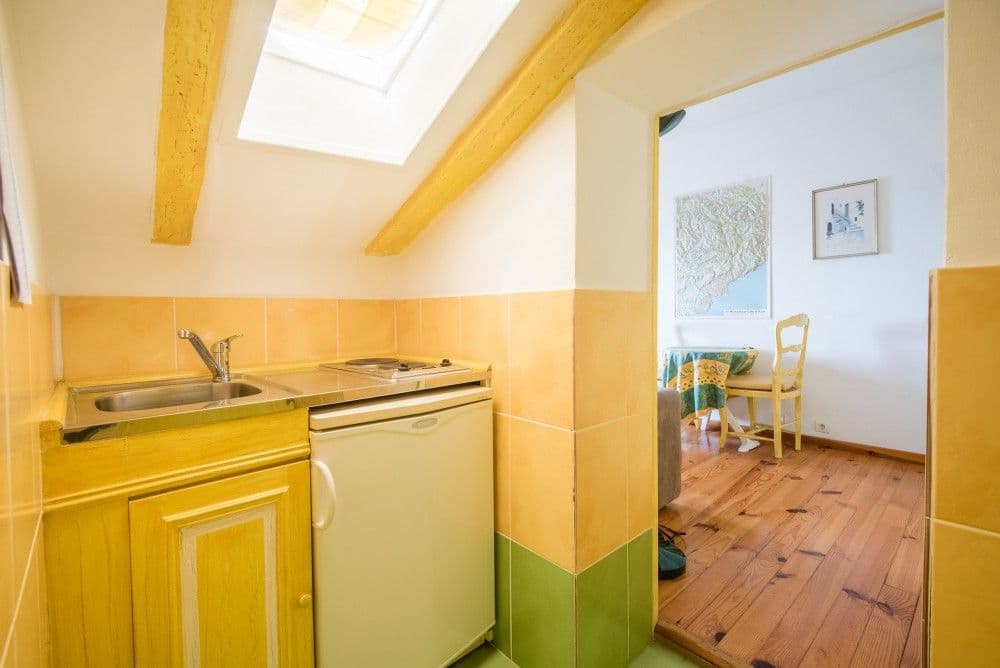 Kitchenette under a skylight, 3-bedroom apartment in the Promenade des Anglais, Nice