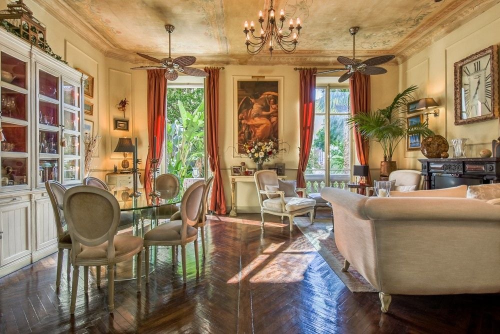 Salon with painted ceiling, chandelier, ceiling fans and herringbone parquet, 2-bedroom apartment in central Nice