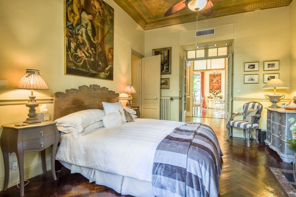 Bedroom with painted ceiling and doors to the salon, 2-bedroom apartment in central Nice