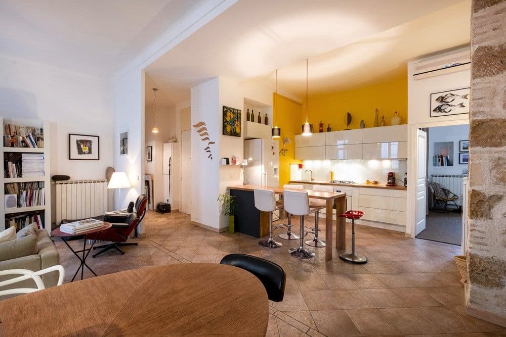 Kitchen and dining area seen from the living room, 3-bedroom apartment in the Port, Nice