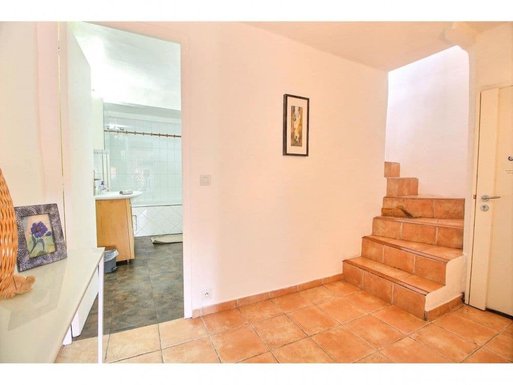 Hallway with stairs to the upper floor and the bathroom, 2-bedroom apartment in the Old Town, Nice