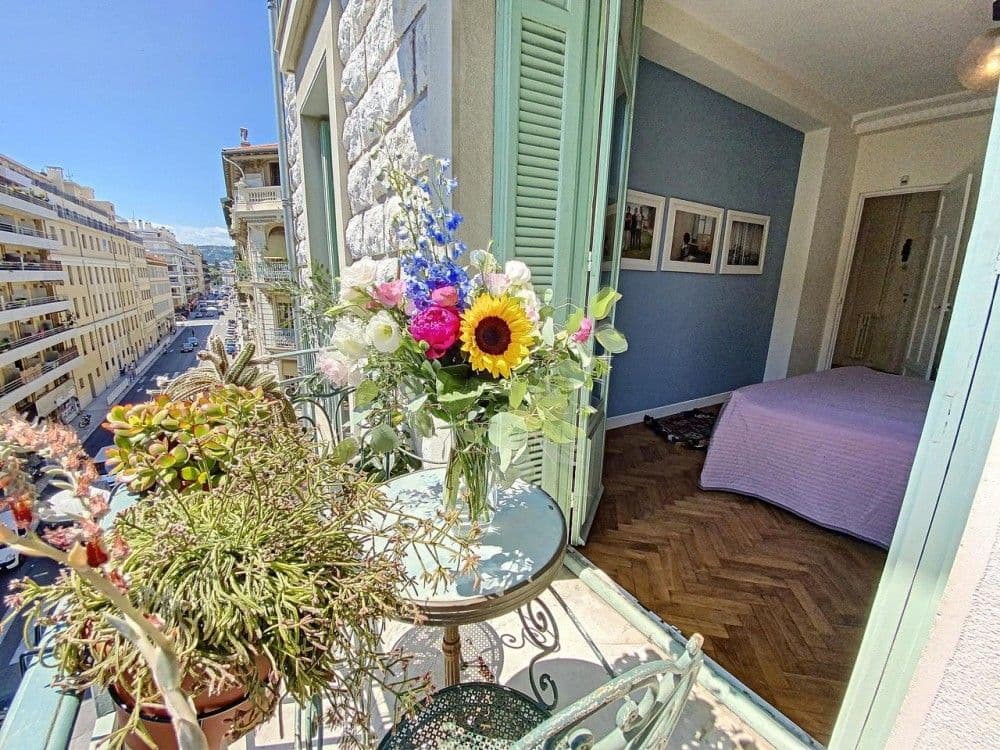 Balcony with plants and a view into the bedroom, 2-bedroom apartment in the Port, Nice