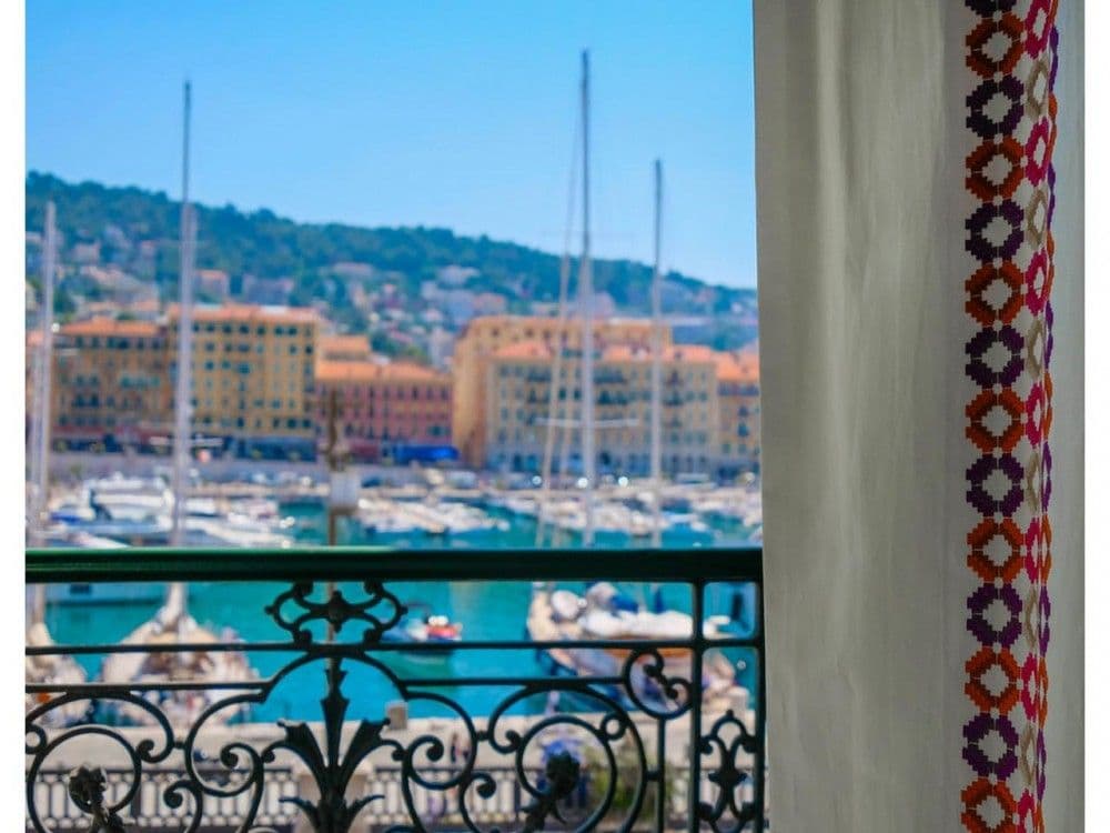 Harbour view from a balcony with wrought-iron railing, 3-bedroom apartment in the Port, Nice